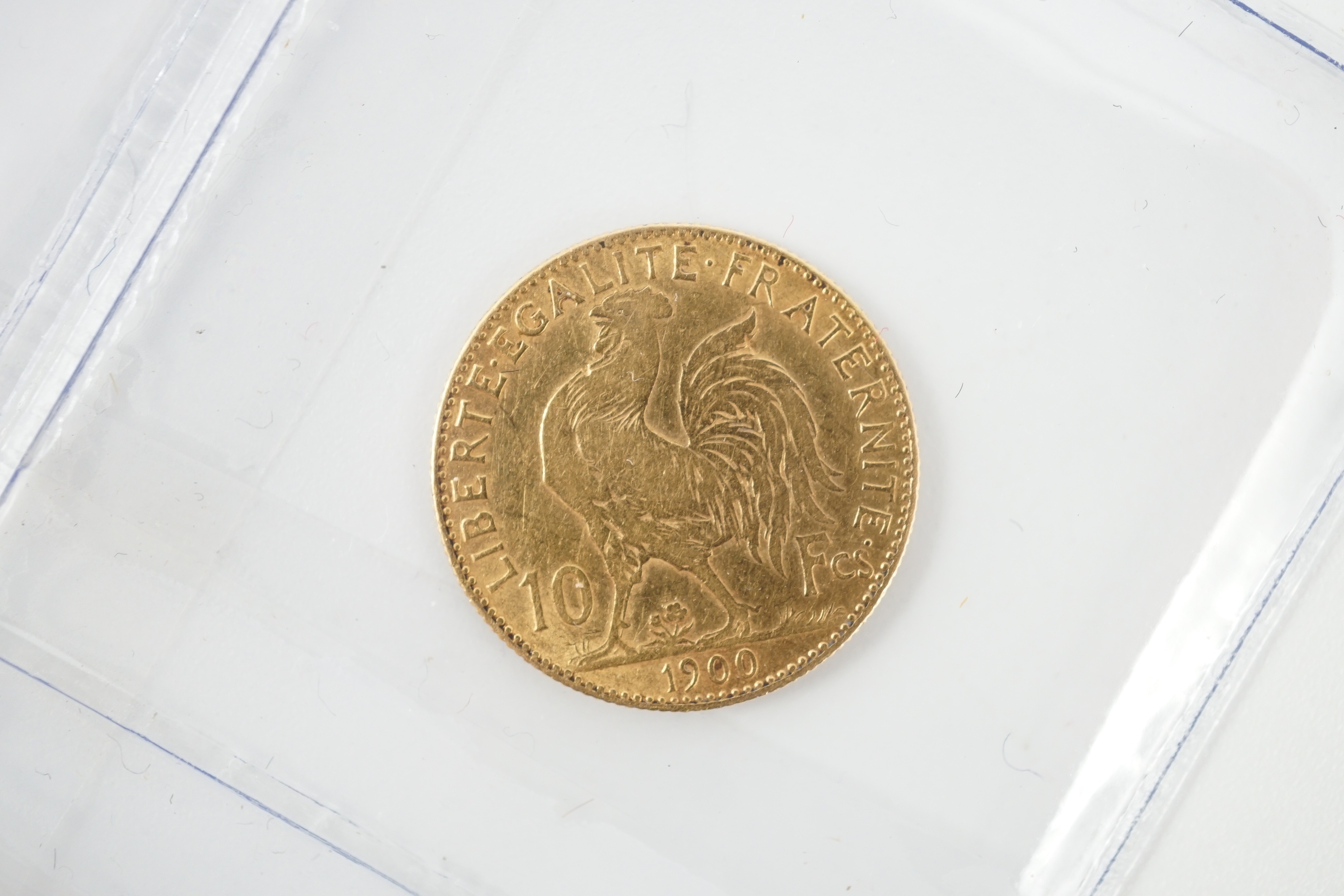 Two gold sovereigns, Victoria 1898M and Edward VII 1910, a George V half sovereign 1913 and a France gold 10 francs 1900 (test mark to portrait).